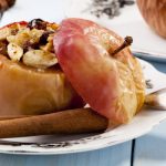 baked apples with pomegranate seeds and walnuts from The Jewish Kitchen
