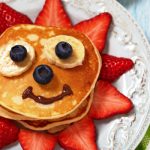 happy face pancakes with berries from The Jewish Kitchen