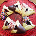 chocolate dipped candy hamantaschen from The Jewish Kitchen