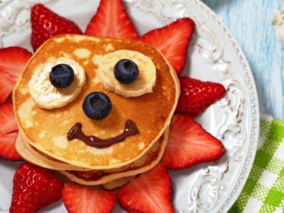 happy face pancakes with berries